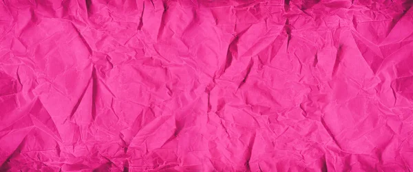 Pink crumpled paper texture. Banner background — Stockfoto