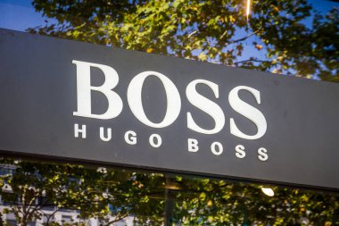 Paris/France - September 10, 2019 : The Hugo Boss luxury store entrance sign on Champs-Elysees avenue