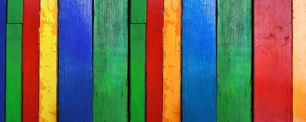 Old multicolor wood board. Banner background texture