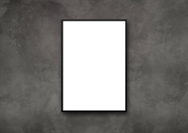 Black picture frame hanging on a dark concrete wall. Blank mockup template
