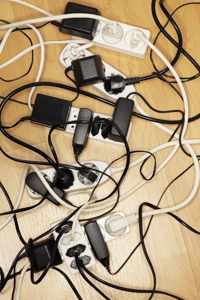 Cables and power adapters Royalty Free Stock Photos