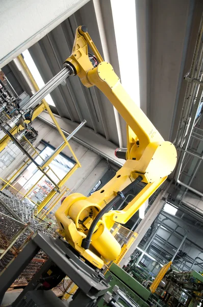 産業オートメーション: 自動ラインとロボット ロイヤリティフリーのストック画像