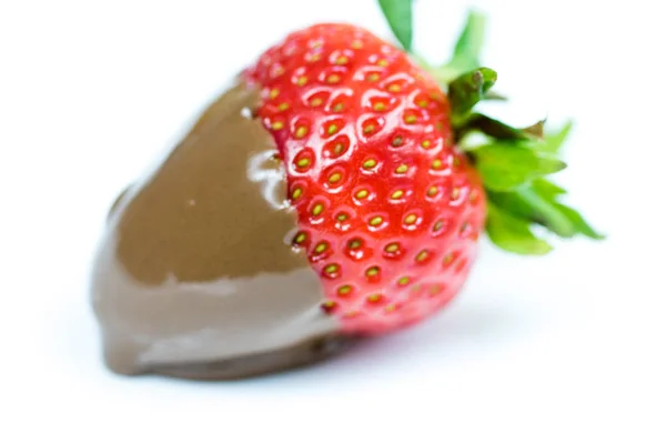 Strawberry in chocolate over white background — Stock Photo, Image