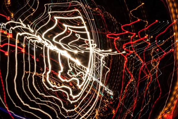Difusões luminosas abstratas de luzes da cidade — Fotografia de Stock