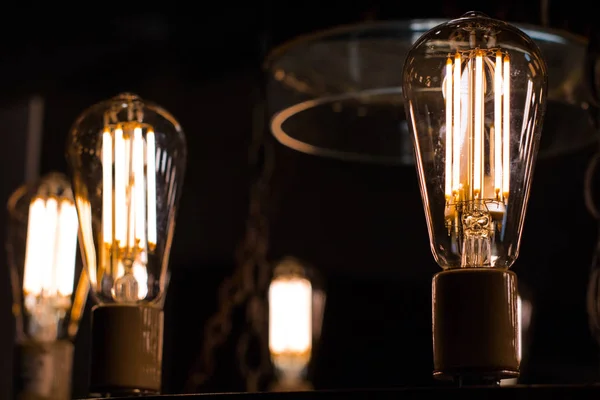 Contamplorary LED light bulds made to look like old school edison style light bulbs. Creating old style look and saving energy. — Stock Photo, Image