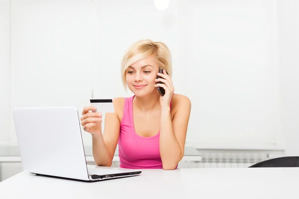 Woman on line shopping credit card laptop — ストック写真