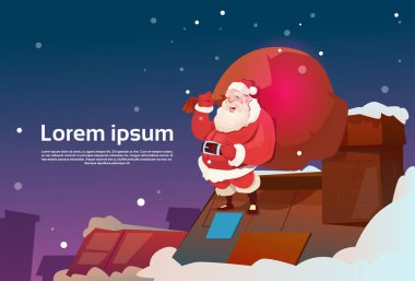 Noel Baba çatıda torbayla