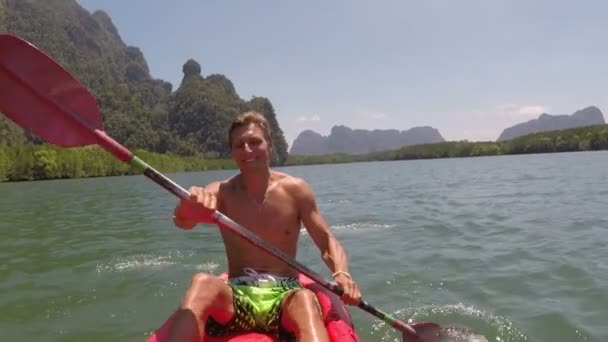 Man Rowing Kayaking In Beautiful Lagoon Action Camera POV Of Young Guy Paddling On Kayak Boat — Stock Video