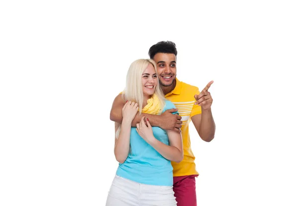 Beautiful Young Happy Couple Love Smiling Embracing, Hispanic Man Woman Point Finger To Empty Copy Space — Stock Photo, Image