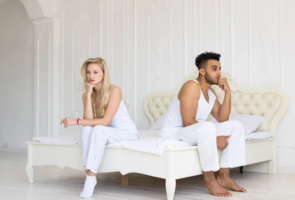 Young Couple Sitting Separate On Bed, Having Conflict Relationships Problem, Sad Negative Emotions Hispanic Man And Woman — Stock Photo, Image