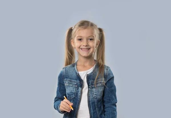 Beautiful Little Girl Hold Pencil Writing Happy Smiling Wear Jeans Coat Isolated — Stock Photo, Image