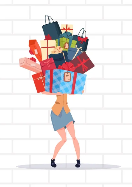 Woman Holding Gift Boxes Stack Over White Brick Wall Background Holiday Presents Concept — Stock Vector