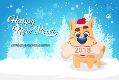 Noel Baba şapkası kış orman Happy New Year Banner kopya alanı ile tebrik üzerinde kemik 2018 işareti ile tutarak köpek