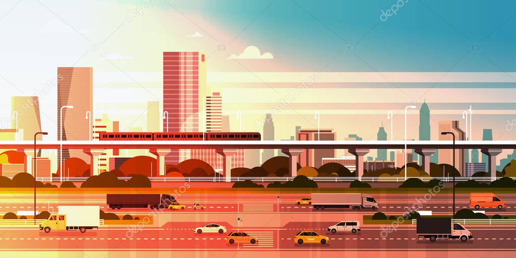 Modern City Over Sunset Background Cityscape With Highway Road And Subway Over Skyscraper Buildings