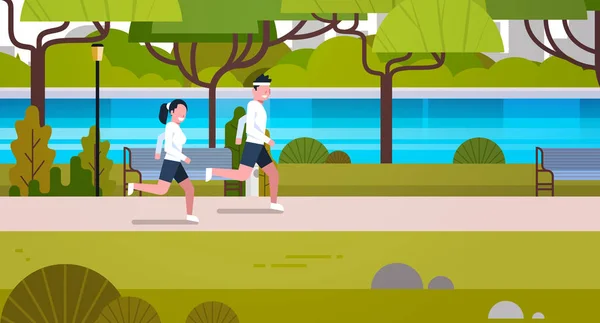 Jovem Casal Apto Jogging Ao Ar Livre No Parque Público Moderno Atividades Esportivas — Vetor de Stock