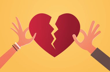 Kadın elleri kırık kalp krizinin parçalarını tutuyor. Kriz, boşanmayı bozuyor. İhanet kavramı düz yatay.