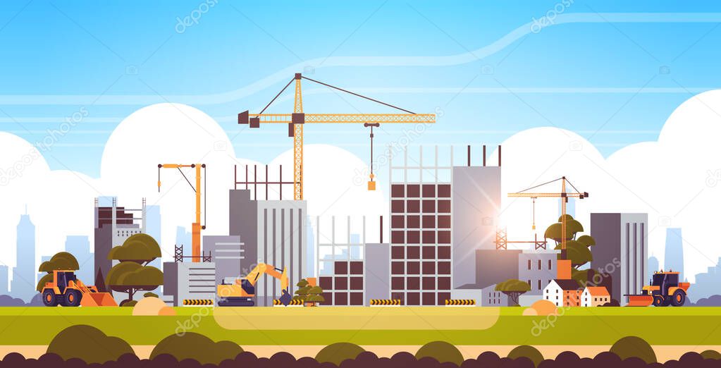 modern construction site with cranes tractor and bulldozer unfinished building exterior sunset background flat horizontal