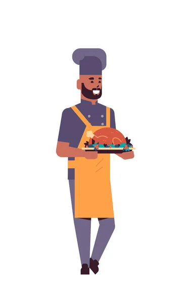 Człowiek gotowanie gotować jedzenie kucharz kurczak mężczyzna pełny pieczone piec przytrzymanie płaski taca talerz Turcja zawodowiec — Wektor stockowy