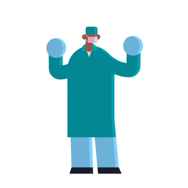 Medico chirurgo maschile indossando guanti chirurgici maschera e verde abito medicina concetto sanitario ospedale clinica medica operaio afro-americano full length piatta — Vettoriale Stock