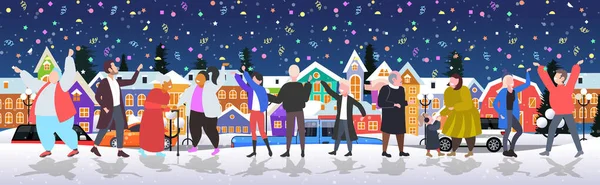Άνθρωποι γιορτάζει Καλά Χριστούγεννα ευτυχισμένο το νέο έτος χειμερινές διακοπές έννοια άνδρες γυναίκες στέκονται μαζί κοντά έλατο δέντρο έχοντας κομφετί κόμμα cityscape φόντο οριζόντια πλήρες μήκος — Διανυσματικό Αρχείο