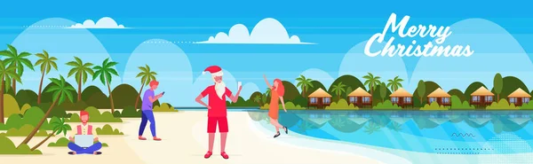 Pessoas na praia tropical ano novo natal férias homens mulheres usando gadgets seascape fundo cartão de saudação horizontal — Vetor de Stock