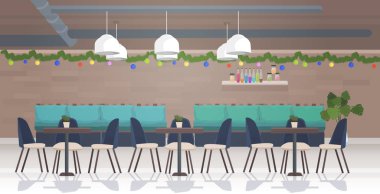 Mutlu noeller ve mutlu yeni yıl kutlamaları için dekore edilmiş restoran modern kafe iç yatay