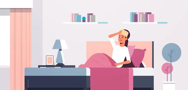 Sick woman with wet towel on forehead unhealthy girl reducing high fever suffering from cold flu virus lying on bed illness concept modern living room interior flat full length horizontal — Stock vektor