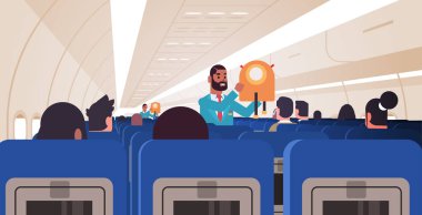 Kamarot yolculara acil durumlarda ceket can yeleklerinin nasıl kullanılacağını anlatıyor. Afro-Amerikan uçuş görevlileri güvenlik gösterimi konsepti modern uçak panosu iç yatay düz konsept.