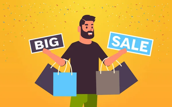 Man holding purchases and big sale banners male customer with shopping bags special offer holiday discount concept flat portrait horizontal — 스톡 벡터
