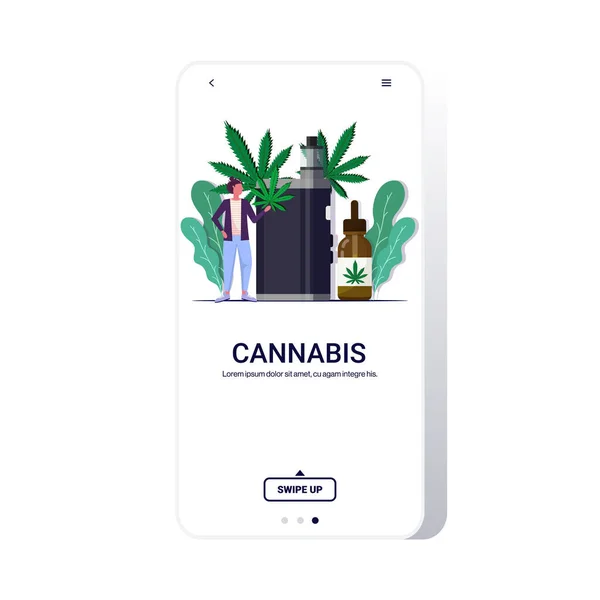 Woman holding cannabis leaf using vaporizer e-cigarette cbd vaping drug consumption concept marijuana liquid for vaping smartphone screen mobile app copy space full length — 图库矢量图片