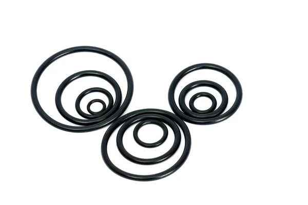Pierścienie gumowe czarne w trzech grupach — Zdjęcie stockowe