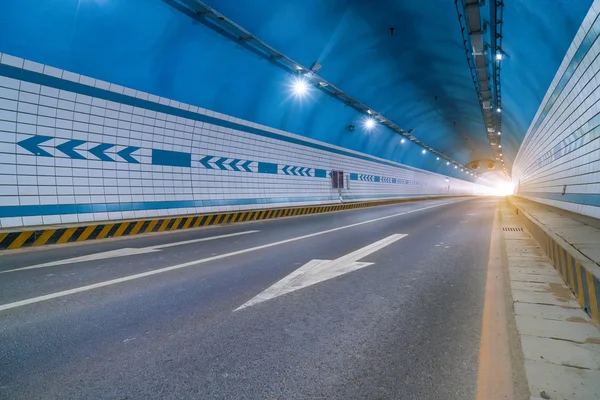 Abstract speed motion in urban highway road tunnel, blurred moti — Stockfoto