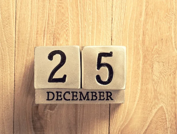 Calendar set on the 25 of December on wooden background — Stock Photo, Image