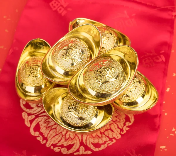 Китайский золотой слиток символизирует богатство и процветание. — стоковое фото