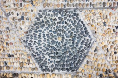 çakıl taşlı bir duvarın yakın plan görüntüsü