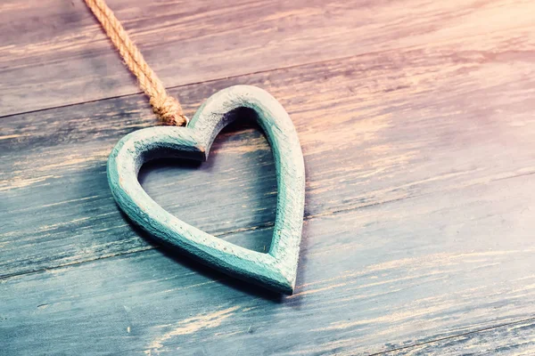 Blue heart on old shabby wooden background — Stock Photo, Image