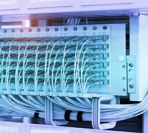 fiber optic telecommunication equipment and patchcords inside a network infrastructure