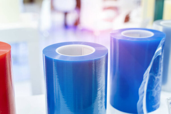 Plastic film wrapping machine for packaging paper box