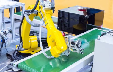 robot arm is working smartly in the production department in artificial intelligence factory clipart