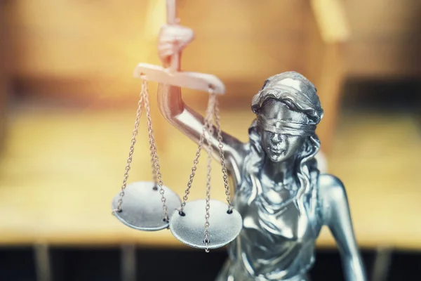 Law theme,Lady Justice Statue on wooden background