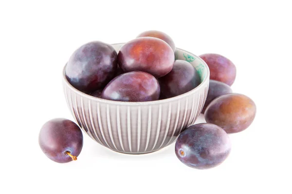 Fruits plums ina bowl isolated — Stock Photo, Image