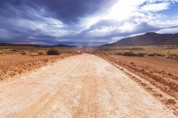 Road in the prairie country — Stock Photo, Image