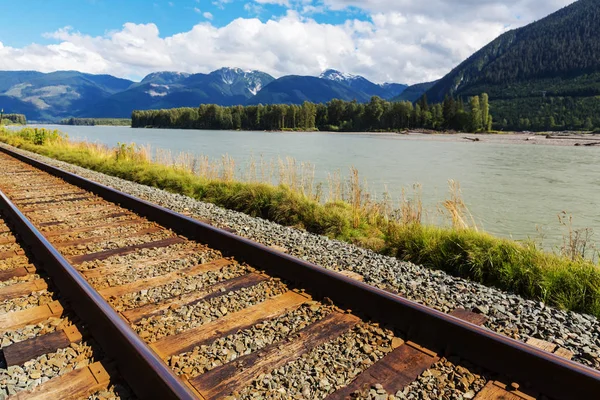 View over a river through the Rocky Mountains Stock Image