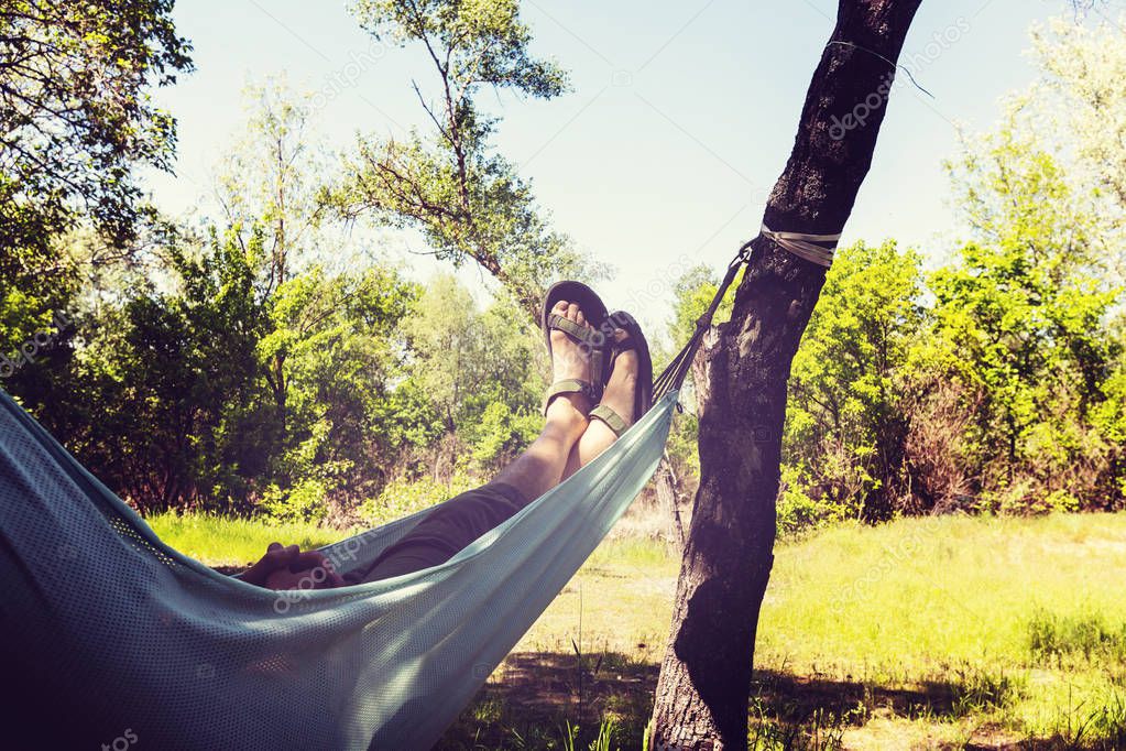 man in Hammock in the tropical beach