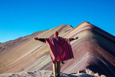 Hiking scene in Vinicunca clipart