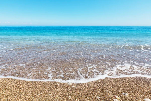 Modrá vlna na pláži — Stock fotografie