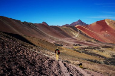 Hiking scene in Vinicunca, Cusco Region, Peru. clipart