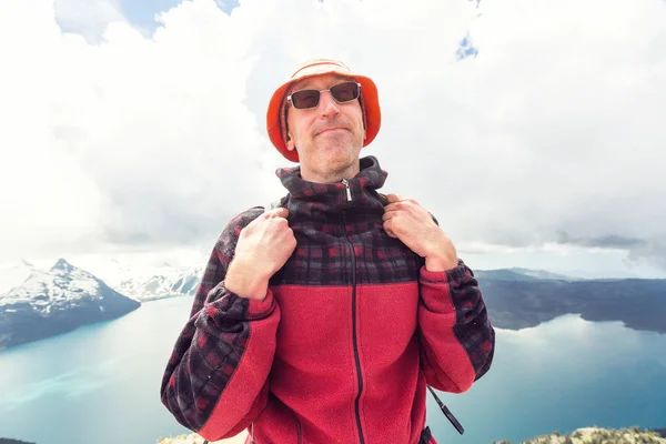 Hiking man in Canadian mountains.