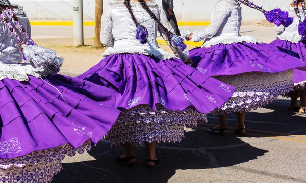 Authentic peruvian dancers on city street