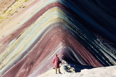 Hiking scene in Vinicunca, Cusco Region, Peru. Montana de Siete Colores,  Rainbow Mountain. clipart